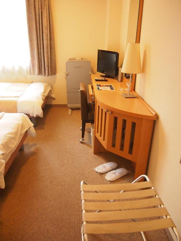 Nest Hotel Kumamoto Quarto foto
