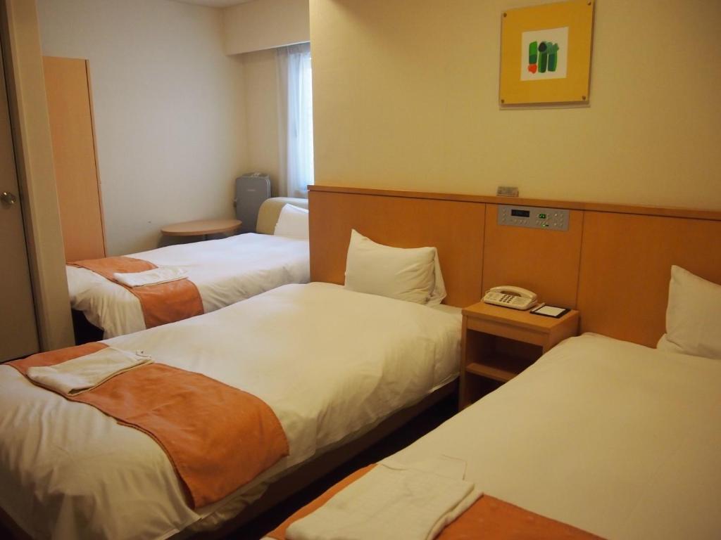 Nest Hotel Kumamoto Quarto foto